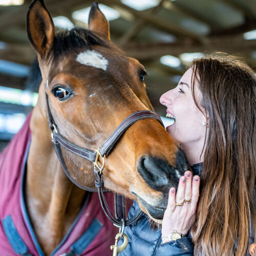 Grace Naclerio, a Connected Horse Volunteer with her horse Tino.
